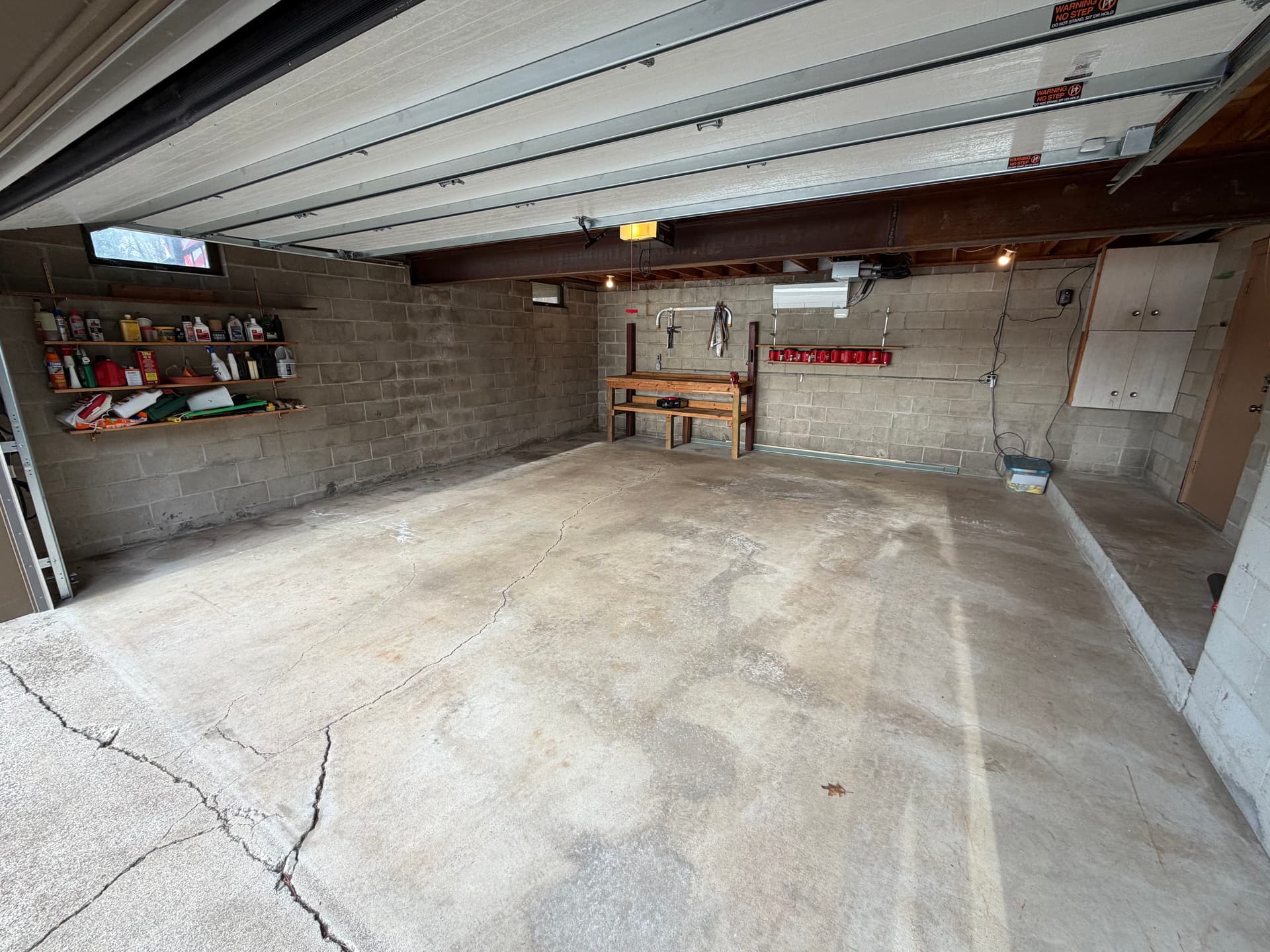 Gallery photos for Cracked Concrete Garage Floor Gets a Full Coating Upgrade: Image #1