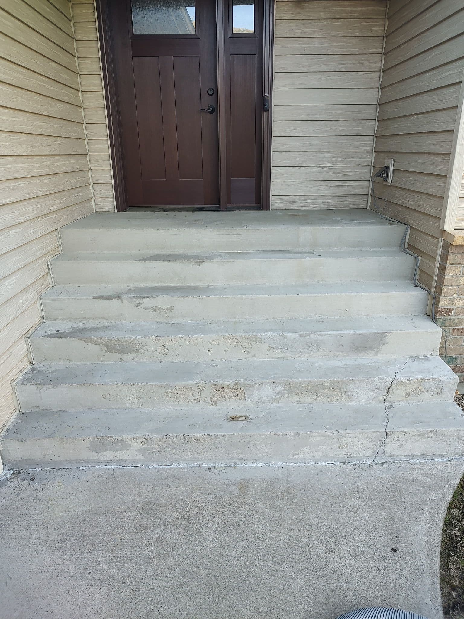 Front Step Concrete Coating in Brainerd MN Gets a Grip image